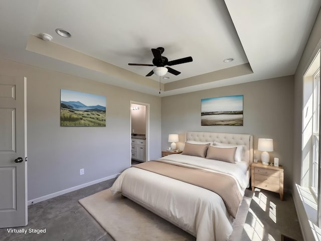 62 Sundance Dr, Lawrenceburg, TN 38464 - bedroom with a tray ceiling, carpet, baseboards, and ensuite bathroom