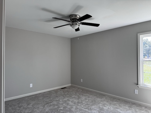 62 Sundance Dr, Lawrenceburg, TN 38464 - spare room featuring a ceiling fan, carpet floors, and baseboards