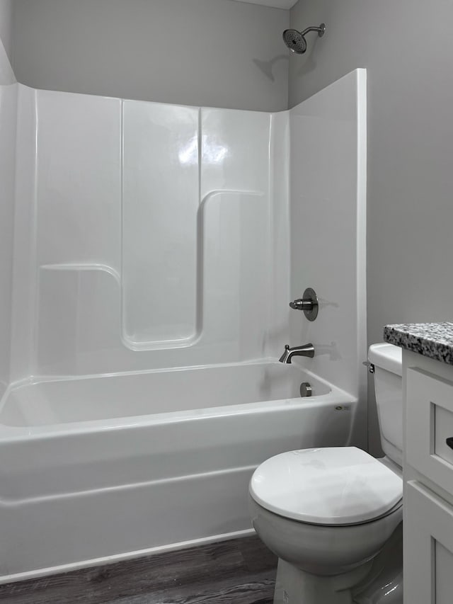 62 Sundance Dr, Lawrenceburg, TN 38464 - bathroom with toilet, wood finished floors, bathing tub / shower combination, and vanity
