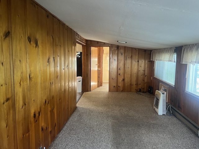 207 Powell St, Decherd, TN 37324 - hallway featuring wood walls, a baseboard radiator, carpet floors, and an AC wall unit