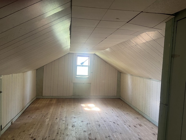 207 Powell St, Decherd, TN 37324 - bonus room with light wood-style flooring, vaulted ceiling, and wooden walls