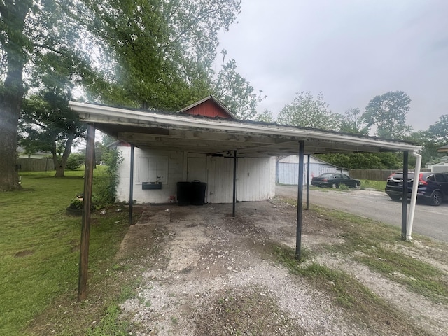 207 Powell St, Decherd, TN 37324 - view of parking / parking lot with a carport