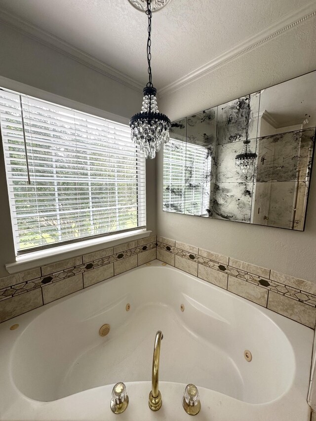 6900 Snow View Ln, Ooltewah, TN 37363 - full bathroom featuring healthy amount of natural light, a whirlpool tub, ornamental molding, a textured ceiling, and a chandelier