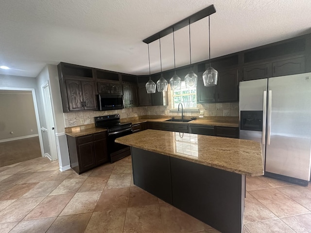 6900 Snow View Ln, Ooltewah, TN 37363 - kitchen with black appliances, a sink, backsplash, baseboards, and light stone countertops