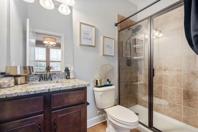 810 Pine Terrace Dr, Brentwood, TN 37027 - bathroom featuring a shower stall, toilet, vanity, tile patterned floors, and baseboards