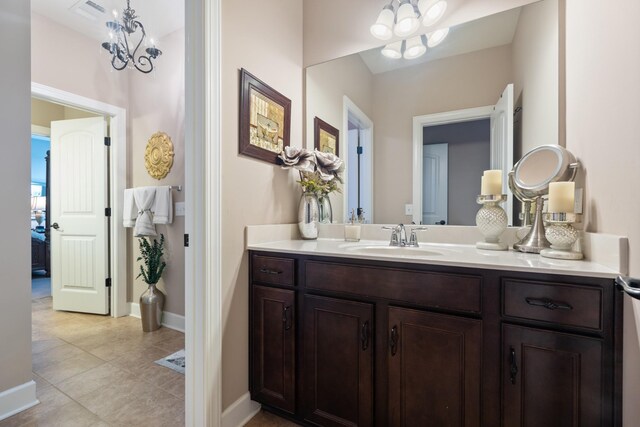 810 Pine Terrace Dr, Brentwood, TN 37027 - bathroom featuring vanity, baseboards, tile patterned flooring, and a chandelier