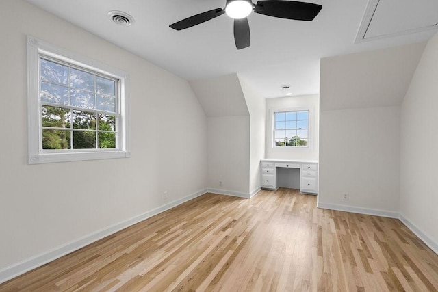 754 Veterans Pkwy, Murfreesboro, TN 37128 - additional living space with light wood finished floors, a ceiling fan, attic access, baseboards, and vaulted ceiling
