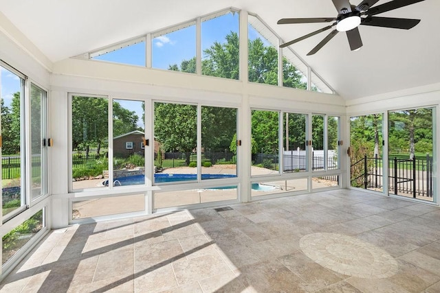 754 Veterans Pkwy, Murfreesboro, TN 37128 - unfurnished sunroom featuring stone tile flooring, high vaulted ceiling, and ceiling fan