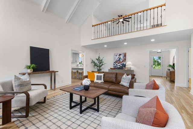 754 Veterans Pkwy, Murfreesboro, TN 37128 - living area featuring high vaulted ceiling, light wood-style flooring, baseboards, beam ceiling, and a ceiling fan