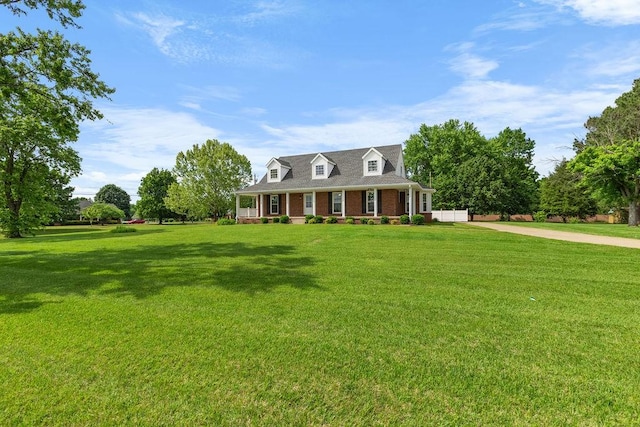 754 Veterans Pkwy, Murfreesboro, TN 37128 - cape cod home featuring driveway, a front yard, and brick siding