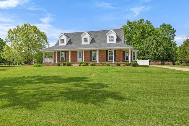 754 Veterans Pkwy, Murfreesboro, TN 37128 - cape cod house with a porch, brick siding, and a front lawn
