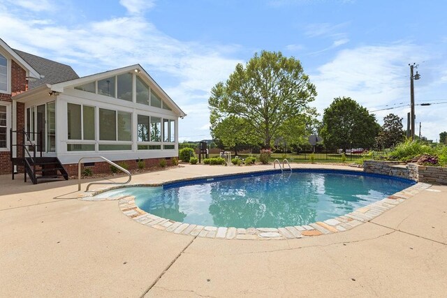 754 Veterans Pkwy, Murfreesboro, TN 37128 - view of swimming pool with a sunroom, a patio, and fence