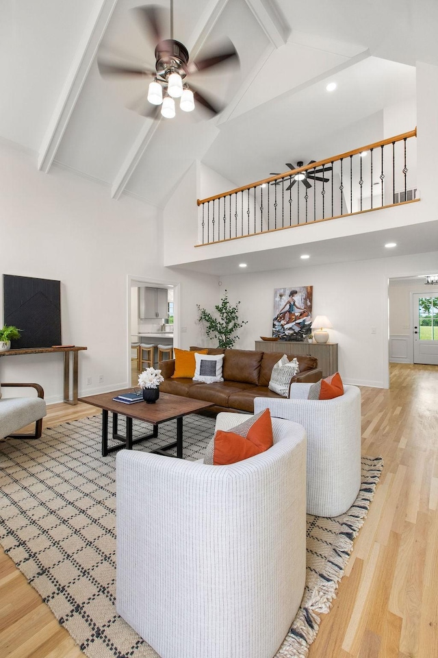 754 Veterans Pkwy, Murfreesboro, TN 37128 - living area with high vaulted ceiling, baseboards, wood finished floors, ceiling fan, and beamed ceiling