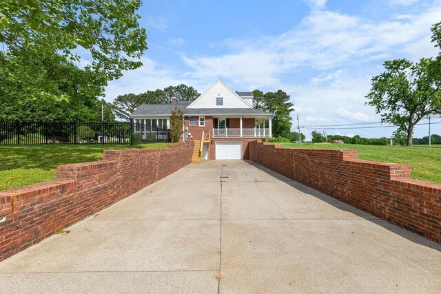 754 Veterans Pkwy, Murfreesboro, TN 37128 - view of front of home with driveway, a garage, and brick siding