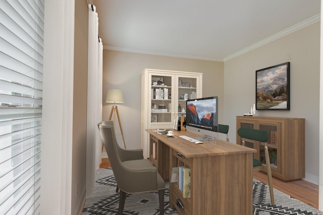 office with ornamental molding and light wood-style flooring