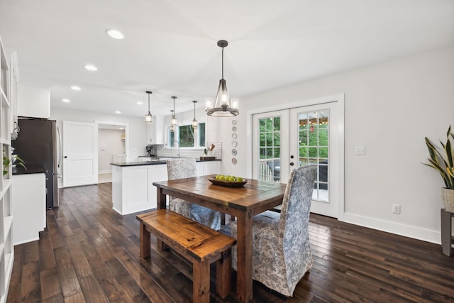 1244 Westfield Rd, Dickson, TN 37055 - dining room with dark wood-style floors, recessed lighting, baseboards, french doors, and a chandelier