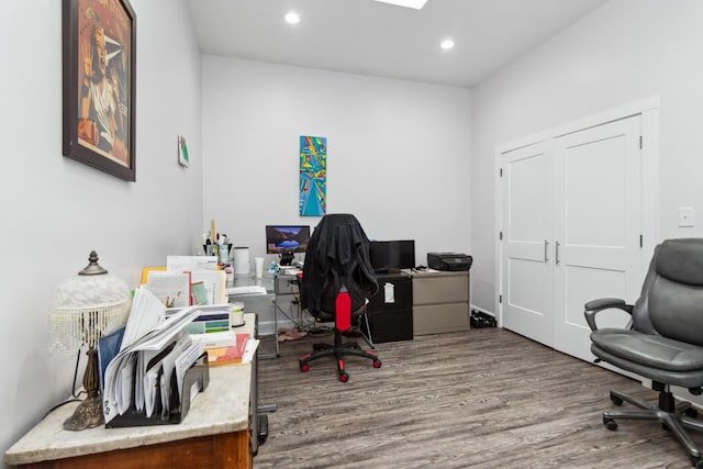 office space with wood finished floors and recessed lighting