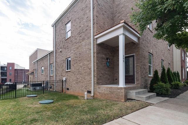 view of home's exterior featuring brick siding