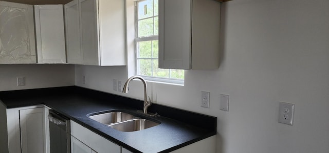 830 Finley Beech Rd, Lewisburg, TN 37091 - kitchen featuring a sink, dark countertops, white cabinetry, and dishwasher