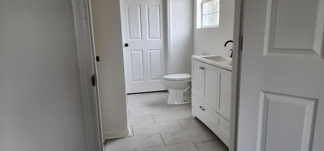 830 Finley Beech Rd, Lewisburg, TN 37091 - bathroom with toilet, vanity, and marble finish flooring