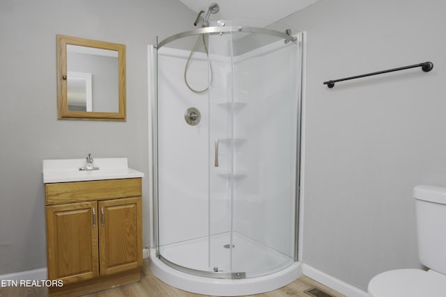 112 Pelham Rd, Knoxville, TN 37914 - bathroom with a stall shower, toilet, vanity, and baseboards