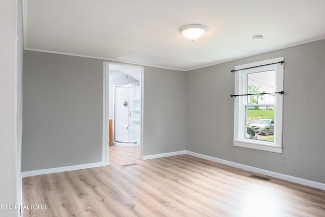 112 Pelham Rd, Knoxville, TN 37914 - empty room featuring wood finished floors, ornamental molding, baseboards, and a smoke detector