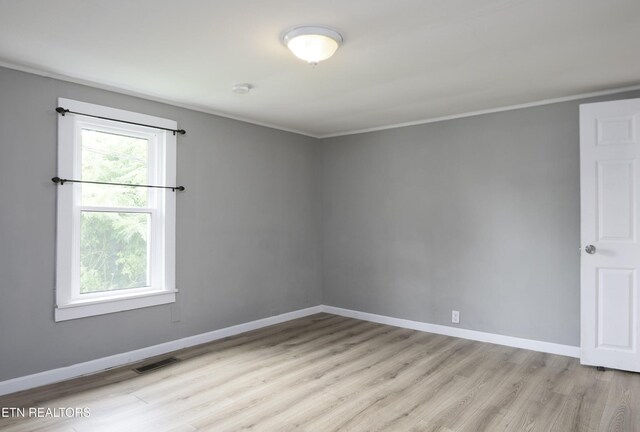 112 Pelham Rd, Knoxville, TN 37914 - spare room featuring light wood-style flooring and baseboards