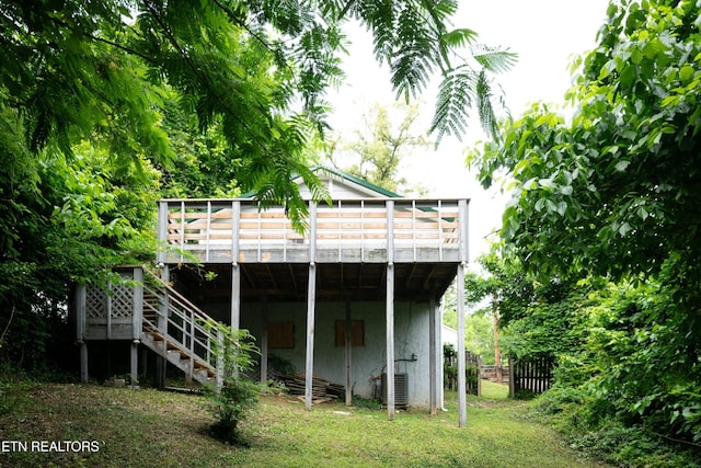 112 Pelham Rd, Knoxville, TN 37914 - back of property featuring central AC unit, a deck, and stairs