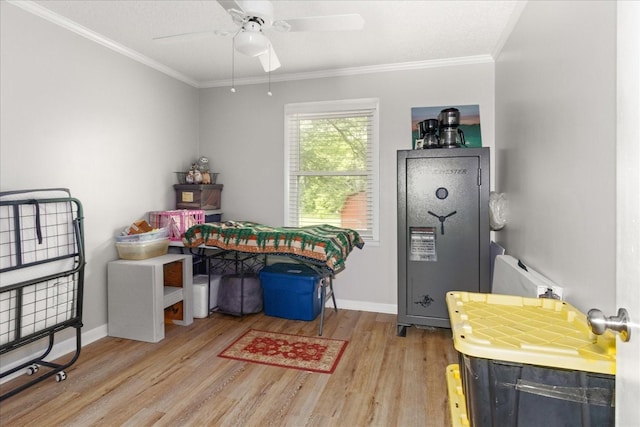 128 Ramsey Rd, Manchester, TN 37355 - misc room with light wood-type flooring, a ceiling fan, ornamental molding, and baseboards