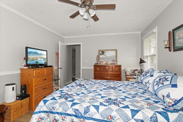 128 Ramsey Rd, Manchester, TN 37355 - bedroom featuring a textured ceiling, crown molding, and ceiling fan