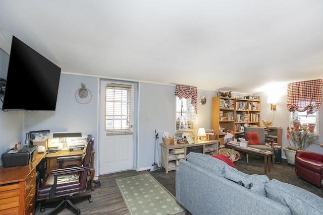 living area with an office area, dark wood-style floors, and baseboards