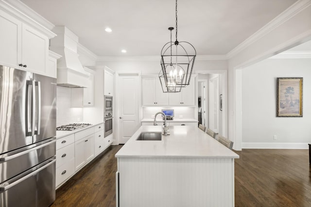 4091 Camberley St, Franklin, TN 37064 - kitchen featuring stainless steel appliances, a sink, decorative backsplash, dark wood-type flooring, and recessed lighting