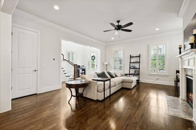 4091 Camberley St, Franklin, TN 37064 - living area with dark wood-style floors, a high end fireplace, stairway, a ceiling fan, and crown molding