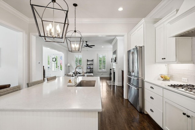 4091 Camberley St, Franklin, TN 37064 - kitchen featuring stainless steel appliances, a sink, a chandelier, open floor plan, and light countertops