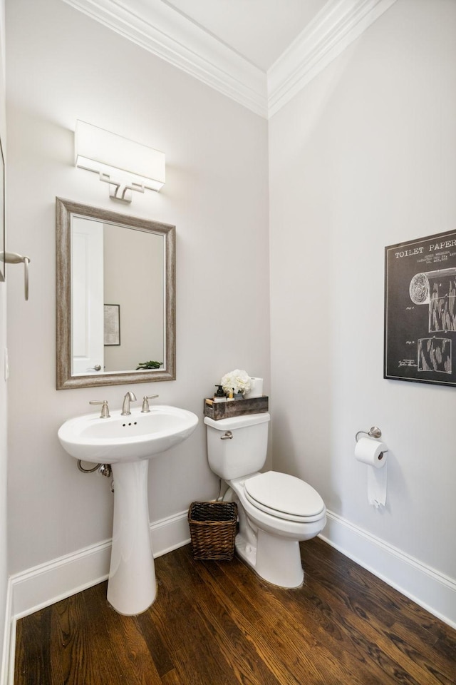 4091 Camberley St, Franklin, TN 37064 - bathroom with crown molding, baseboards, wood finished floors, and toilet