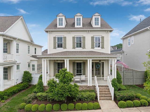 4091 Camberley St, Franklin, TN 37064 - view of front facade with covered porch, fence, and a shingled roof