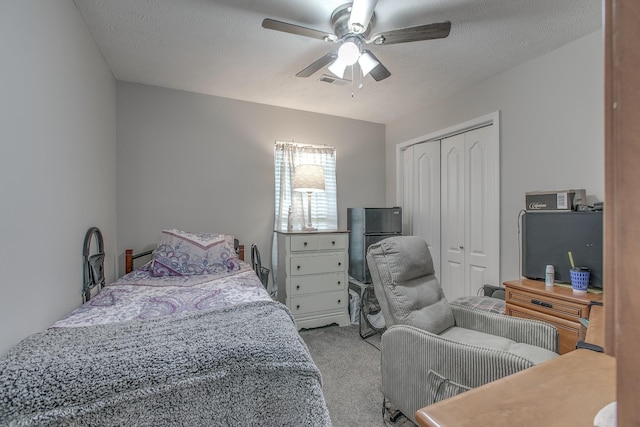 5064 Tricia Pl, Murfreesboro, TN 37129 - bedroom featuring carpet floors, a closet, a textured ceiling, and ceiling fan
