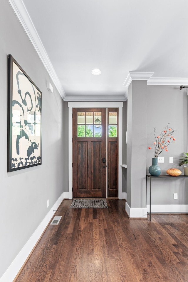 3610 Pilcher Ave, Nashville, TN 37209 - foyer entrance featuring ornamental molding, dark wood-type flooring, and baseboards