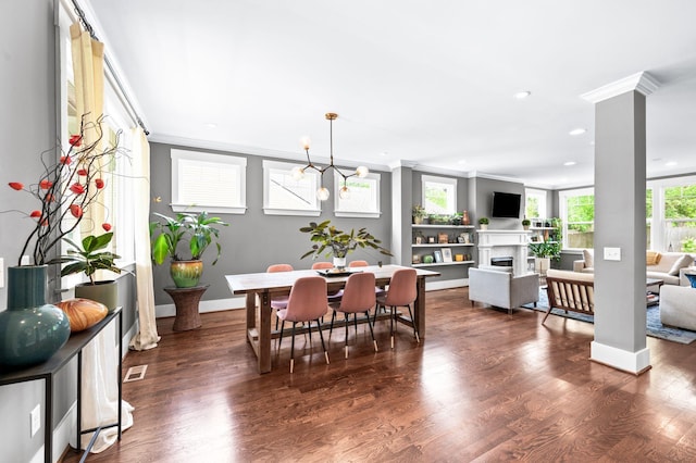 3610 Pilcher Ave, Nashville, TN 37209 - dining area with ornamental molding, recessed lighting, a fireplace, dark wood-type flooring, and baseboards