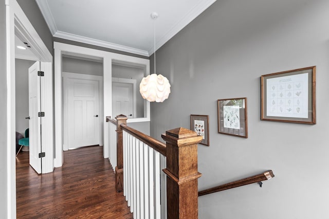3610 Pilcher Ave, Nashville, TN 37209 - corridor featuring dark wood-style floors, ornamental molding, an upstairs landing, and baseboards
