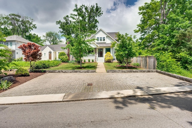 3610 Pilcher Ave, Nashville, TN 37209 - view of front facade featuring fence and covered porch