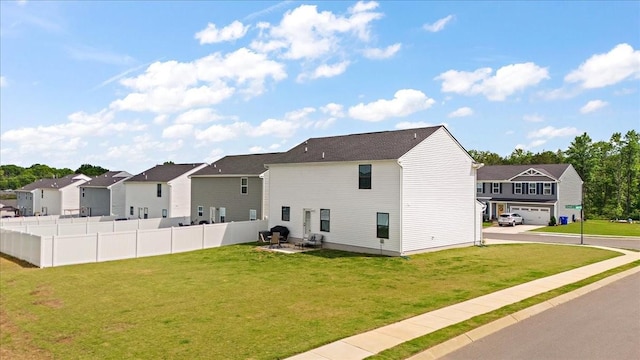 back of house with a residential view