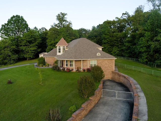 168 Maple Valley Ln, Cookeville, TN 38506 - view of front of property with a gate, brick siding, and a shingled roof