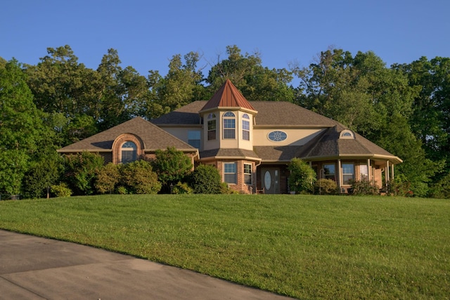 168 Maple Valley Ln, Cookeville, TN 38506 - victorian home featuring a front lawn and brick siding