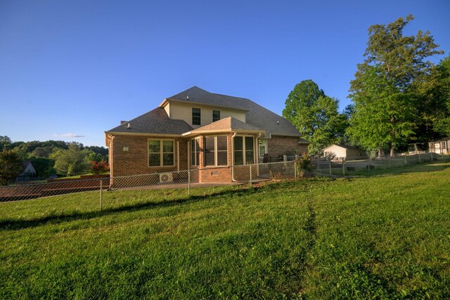 168 Maple Valley Ln, Cookeville, TN 38506 - rear view of property with brick siding and a sunroom