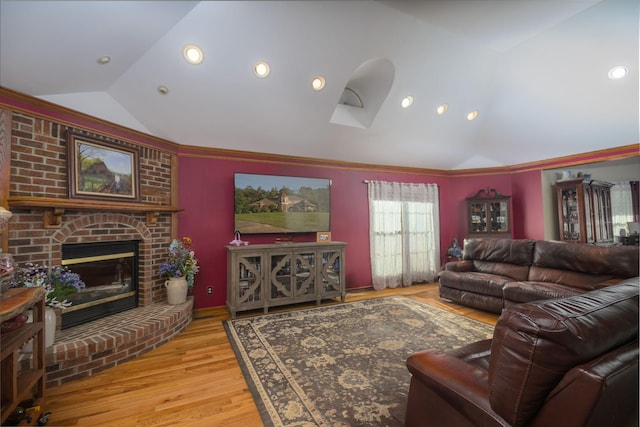 168 Maple Valley Ln, Cookeville, TN 38506 - living area with lofted ceiling, wood finished floors, a fireplace, recessed lighting, and ornamental molding