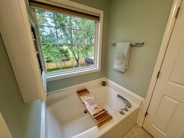 full bathroom with a bath