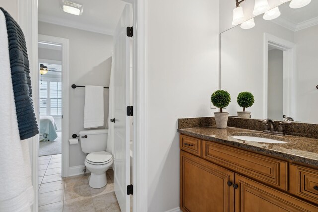 336 Alfred Ladd Rd E, Franklin, TN 37064 - bathroom with toilet, ornamental molding, vanity, ensuite bathroom, and tile patterned floors