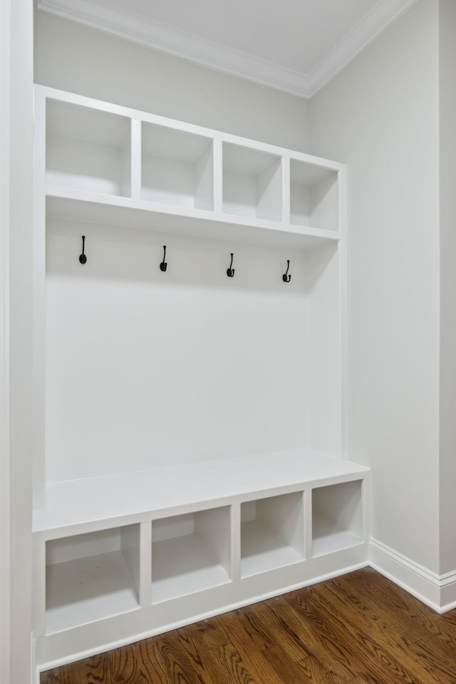 336 Alfred Ladd Rd E, Franklin, TN 37064 - mudroom with crown molding, dark wood-style flooring, and baseboards