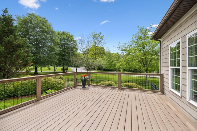 336 Alfred Ladd Rd E, Franklin, TN 37064 - wooden deck with view of scattered trees and a lawn